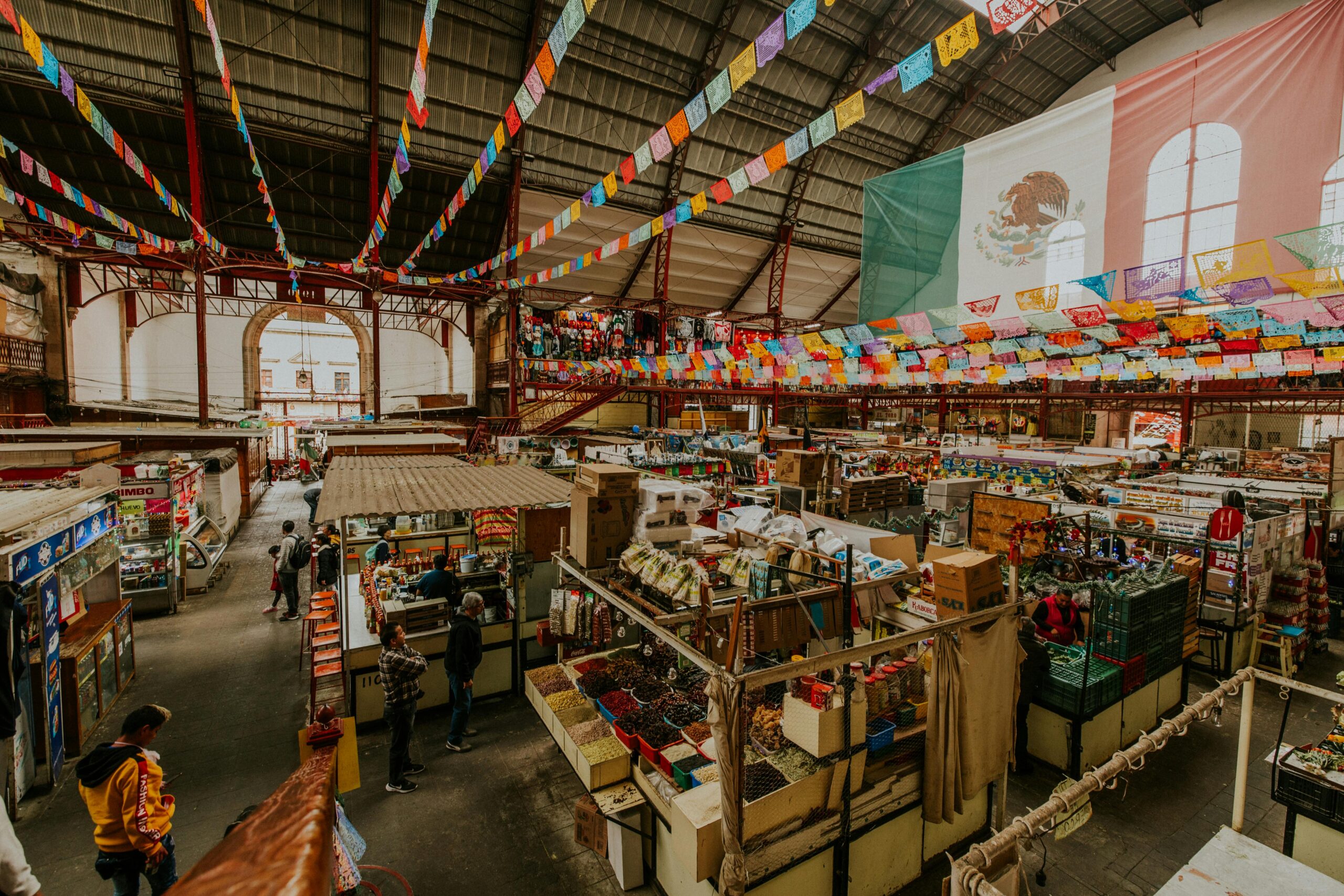 The Olas Altas Farmers Market is one of the reasons that travelers should visit Puerto Vallarta in May. 
pictured: a market in Mexico 